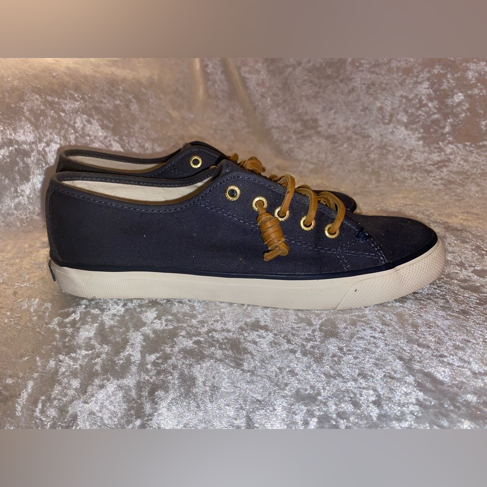 Navy blue Sperry shoes.